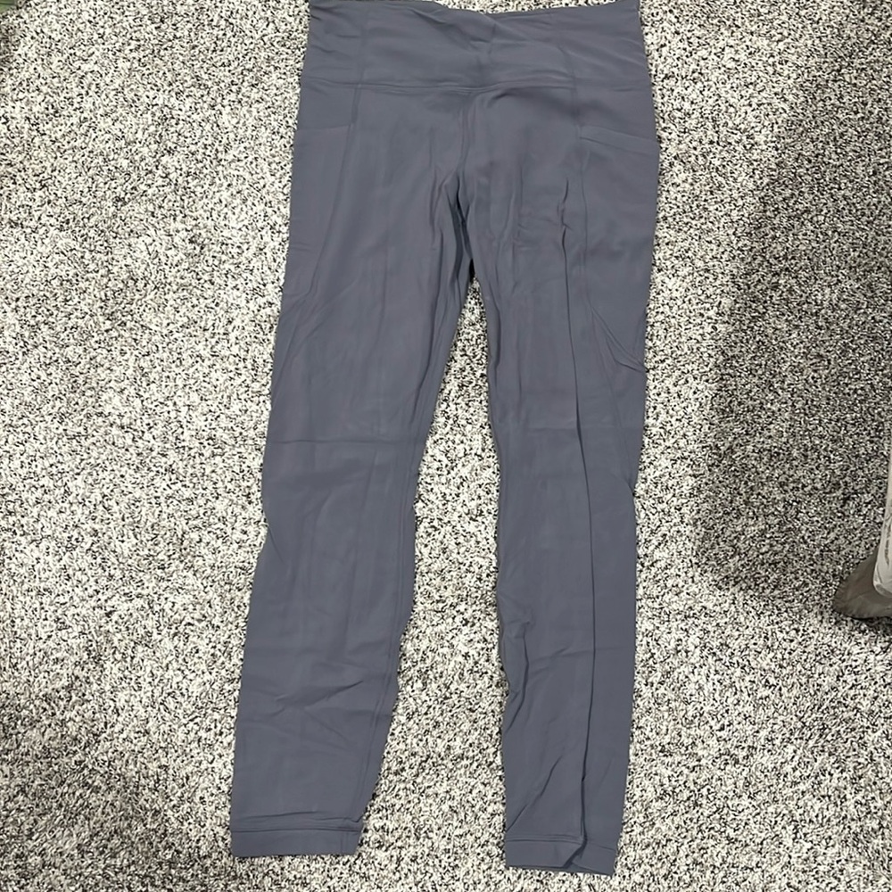 Athleta side stash pocket leggings size medium